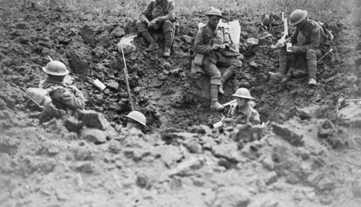 34_Canadians resting in shell hole made by our artillery. Battle of Amiens. August, 1918
